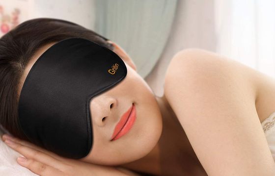 Woman Wearing Black Silk Sleep Eye Mask