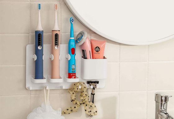 Electric Toothbrush Holder On Tiled Wall