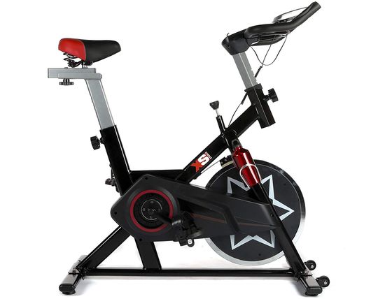 Stationary Bike For Workout With Red Saddle