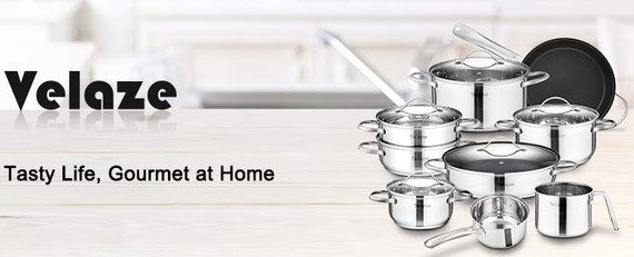 Steel Induction Cookware Set On White Table