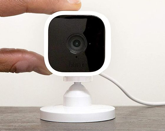 Motion Sensor Camera With White Cable