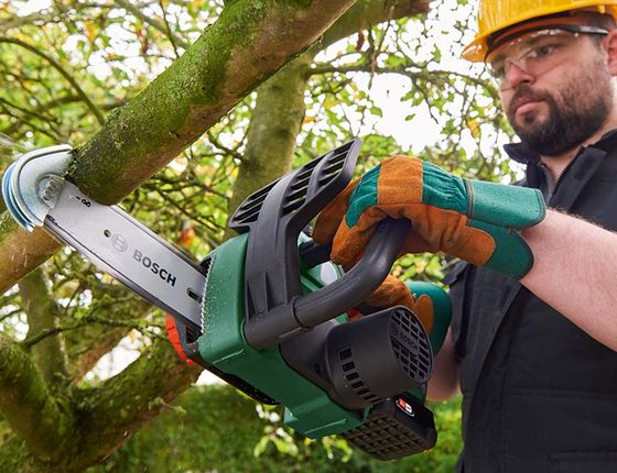 Mini Electric Chainsaw In Black And Green
