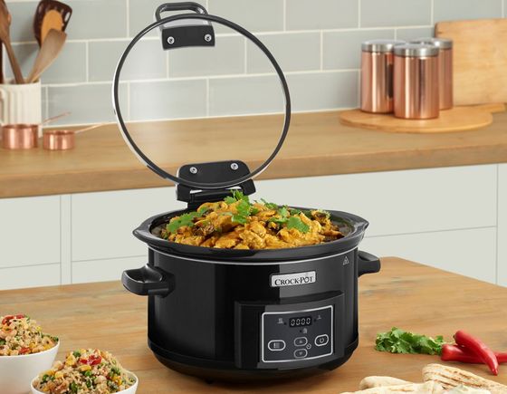 Slow Cooker With Black Handles And Clear Lid