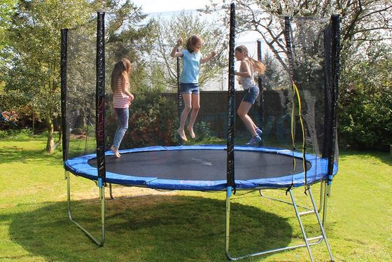 Trampoline With Rain Cover On Lawn
