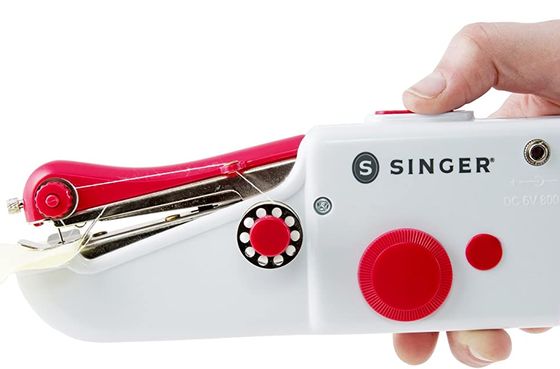 Handheld Sewing Machine In Red Packaging
