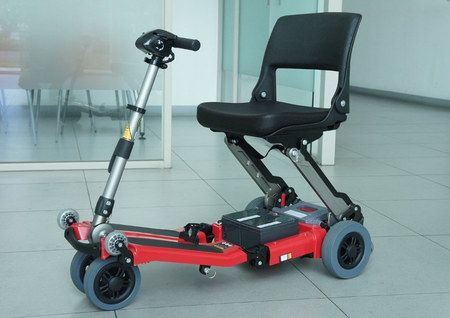 Electric Mobility Scooter In Black And Red