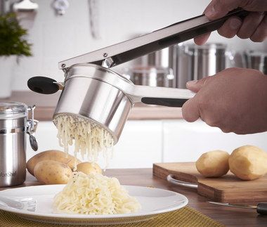 Durable Steel Professional Potato Ricer Above Plate