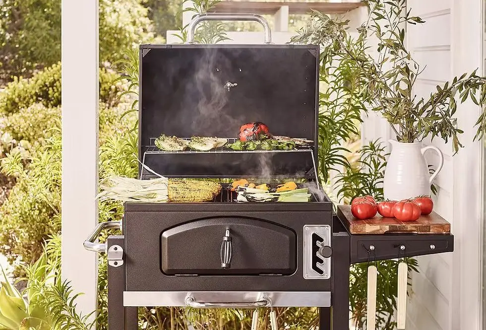 Black BBQ Smoker With Corn On Grill