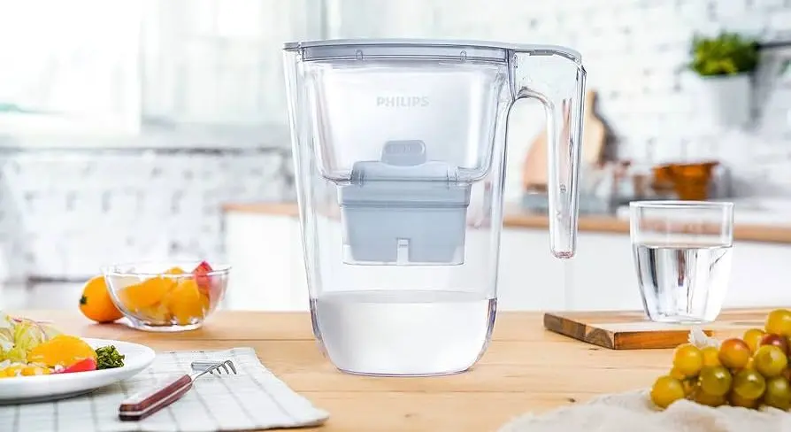 Water Jug And Filter On Table