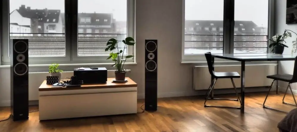 Black 5.1 Surround Sound System On Wood Floor