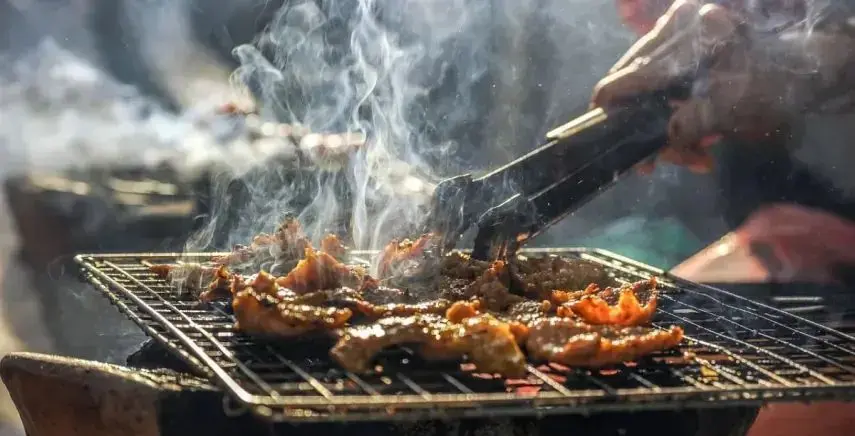 Meat On Hot Grill Plate BBQ