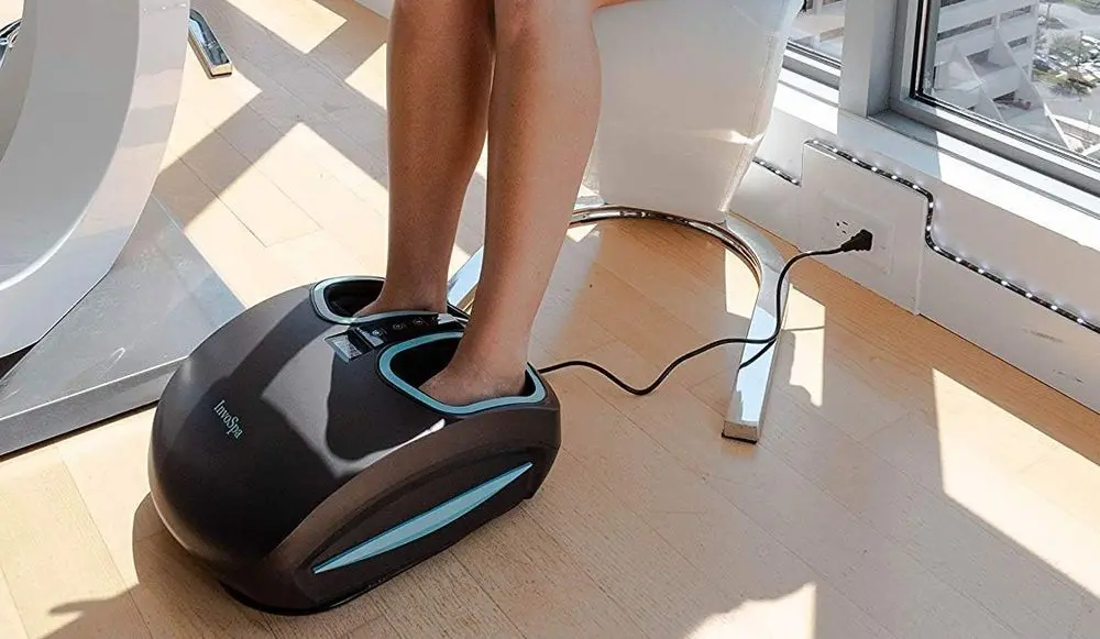 InvoSpa Foot Massager Machine On Wood Floor