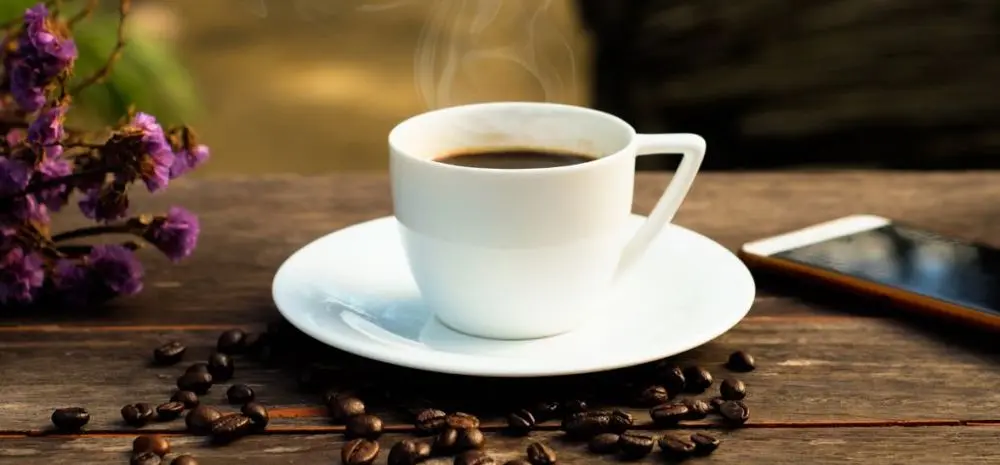 Cup Of Coffee With Beans