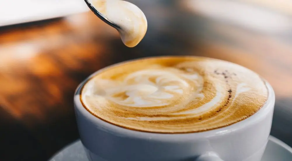Latte And Froth Pouring