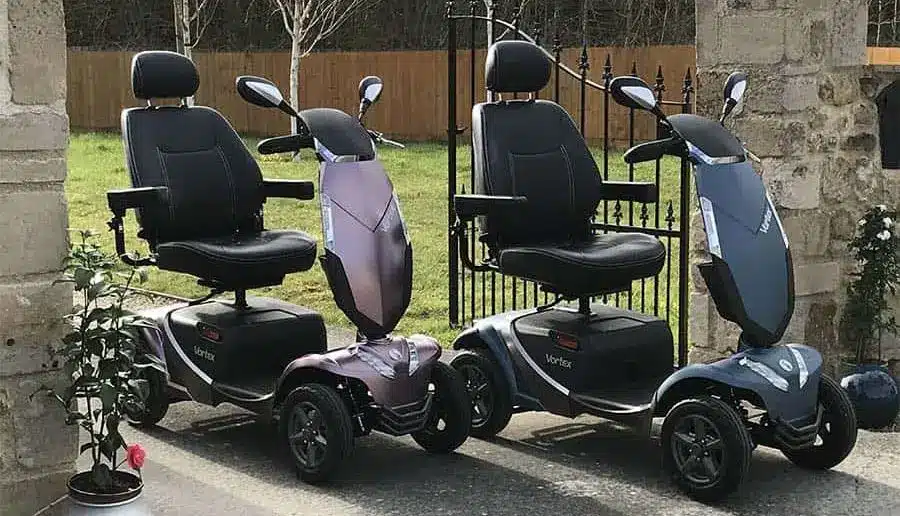 Power Scooters At Home Gate