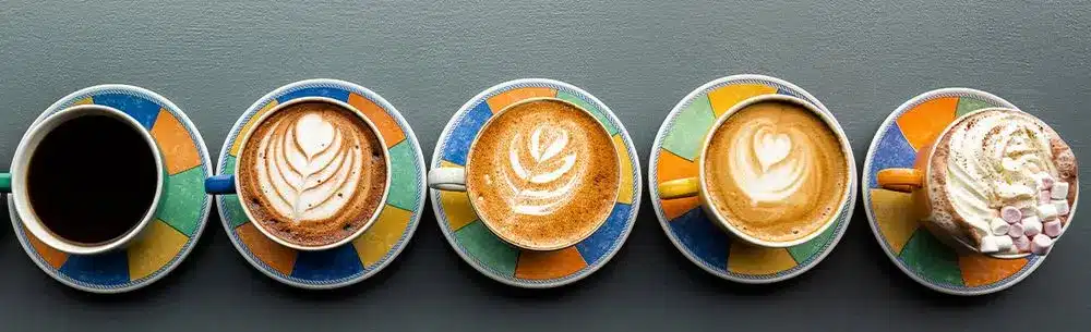 Five Coffee Latte Cups Lined Up