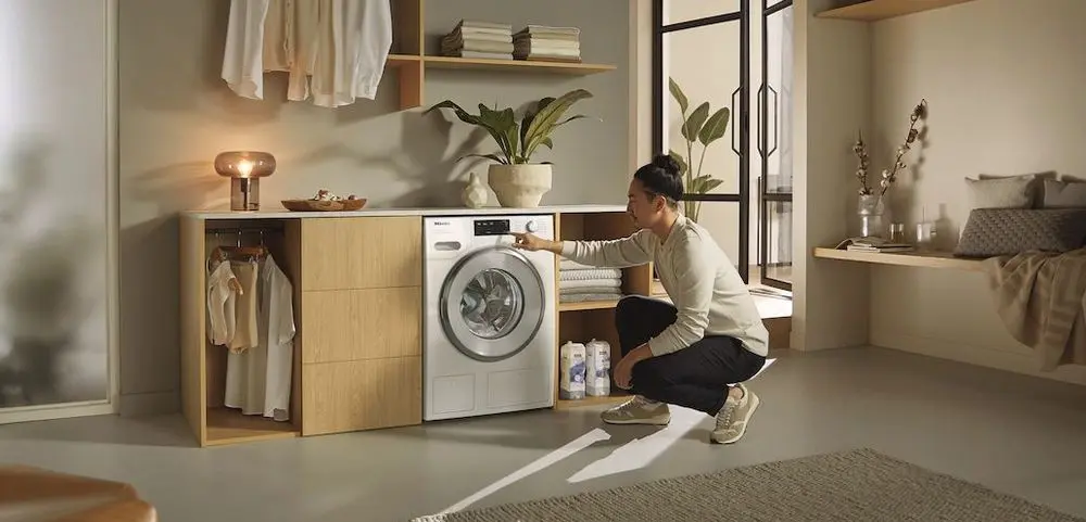 Compact Washing Machine On Grey Floor