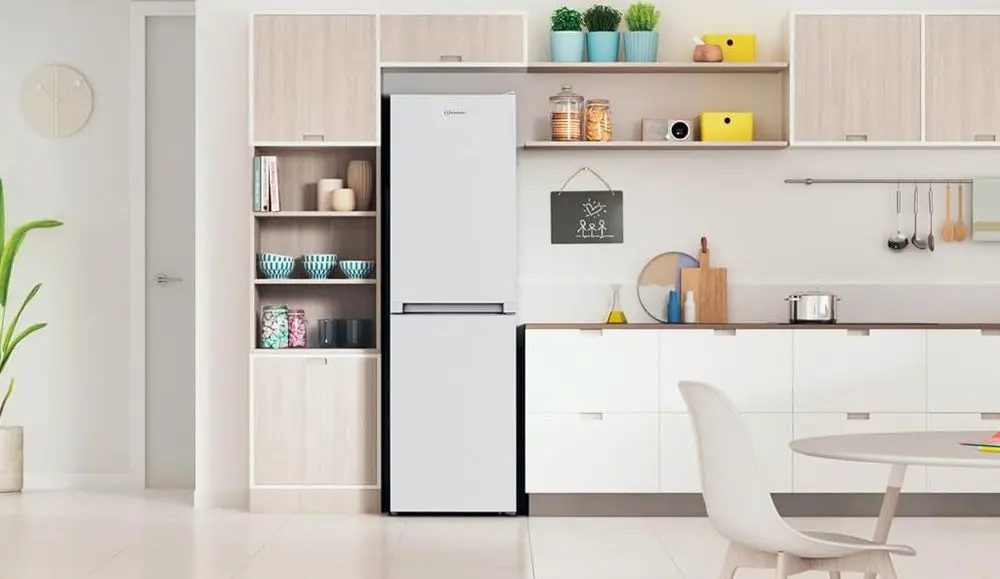 Indesit 230L Integrated Fridge Freezer On White Flooring