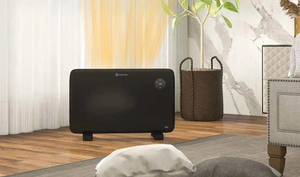 Electric Convection Radiator On Wood Floor