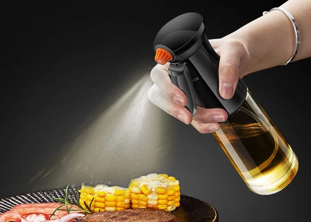 Glass Cooking Oil Spritzer Bottle In Hand