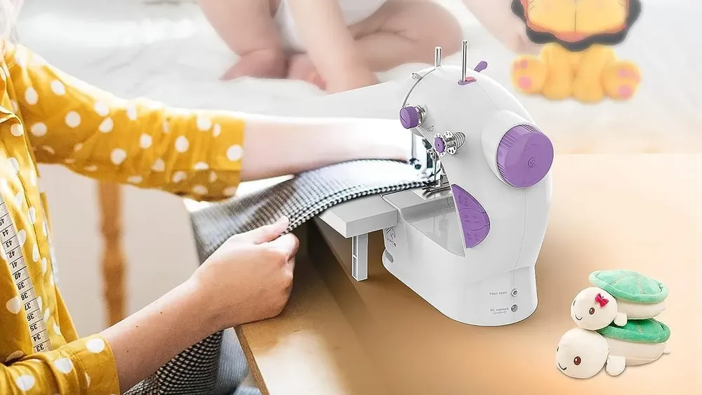 KPCB Tech Store Mini Sewing Machine On Table
