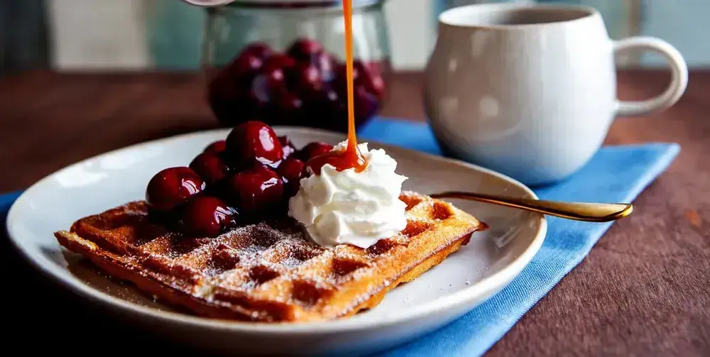 Cream And Waffles On Plate