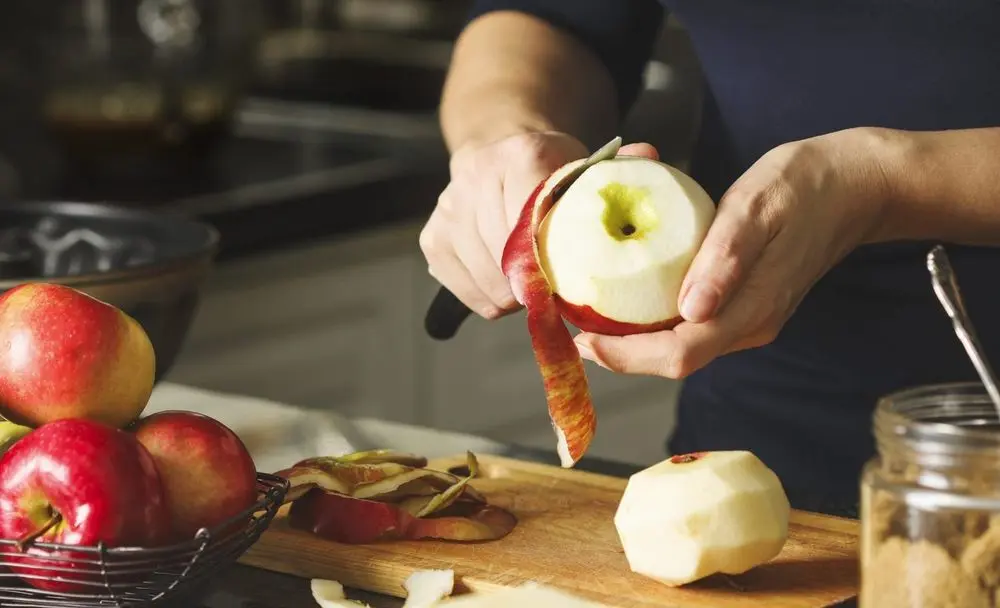 Hand Peeling An Apple