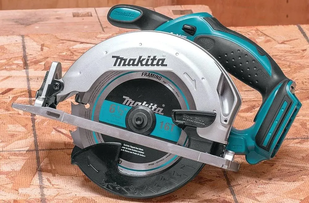 Makita DSS611Z LXT Circular Saw On Wooden Board