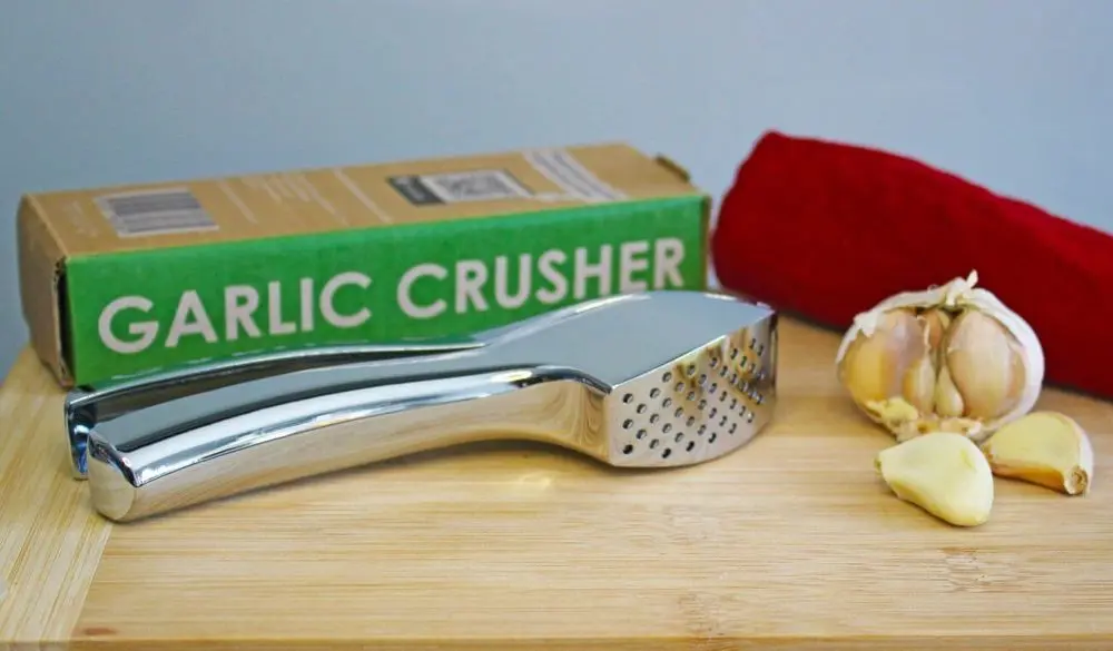 Stainless Steel Garlic Press And Cloves
