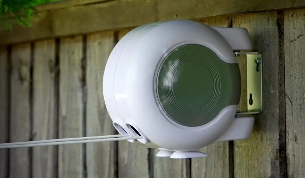 Exterior Retractable Clothesline On Garden Fencing