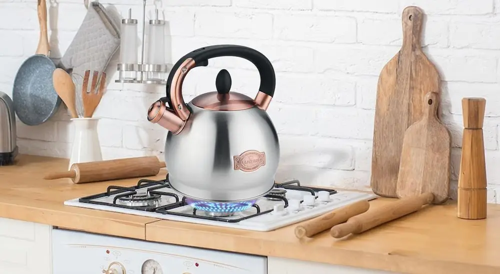 Gas Stove Top Kettle In Kitchen