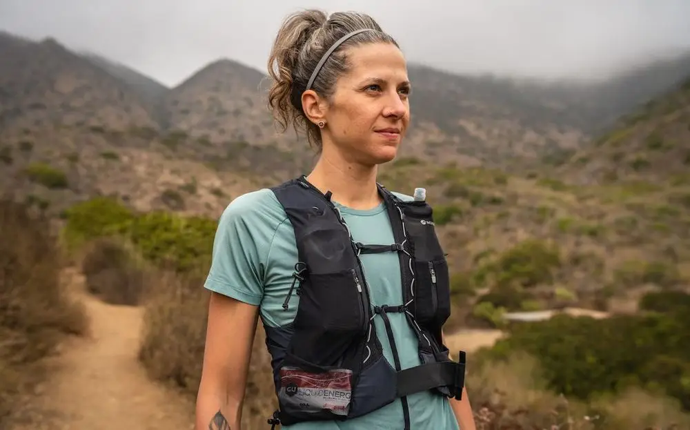 Big 2l Hydration Bladder On Woman. Best Running Hydration Vest Backpack Packs.
