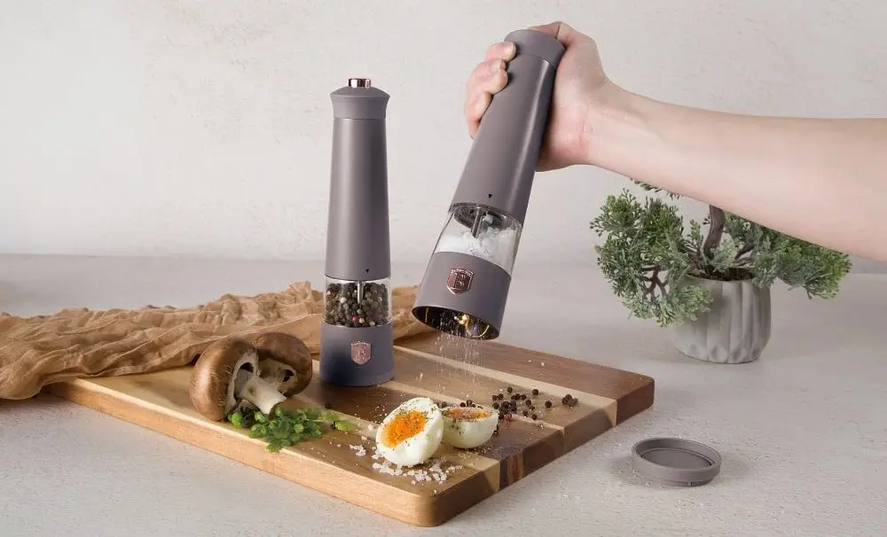 Salt And Pepper Grinder Set On Eggs