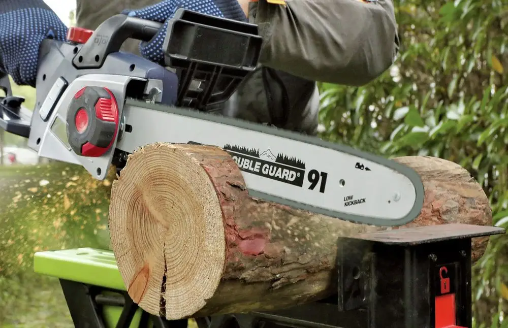 Battery-Powered Chain Saw On Log