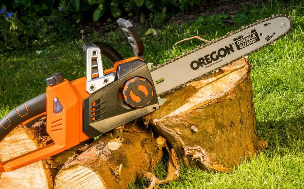 Cordless Electric Chain Saw On Trunk