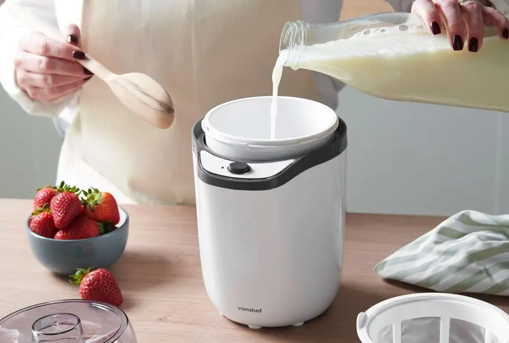 Milk Poured Into Yoghurt Machine In White
