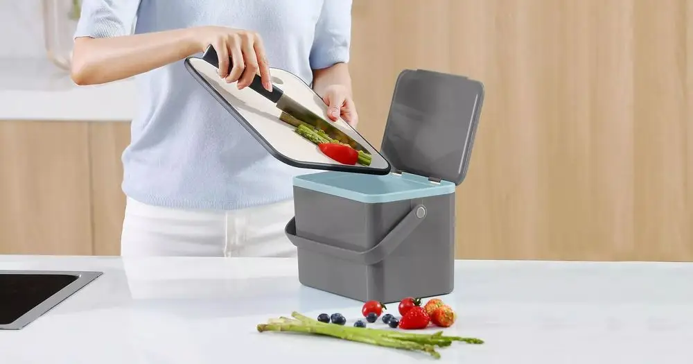Grey Food Waste Caddy In Kitchen