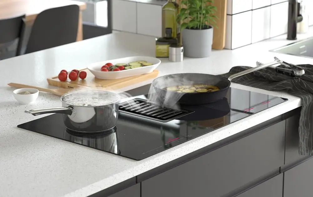 Induction Hob With Integrated Extractor In Centre